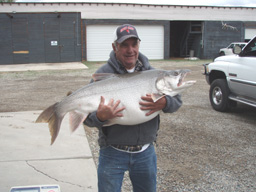 Don Walker, 61, now holds the record for the biggest lake trout caught in Colorado: The  fish weighed 50 pounds, 5 ounces, measured 44 1/4 inches long with a girth of 34 3/8 inches.