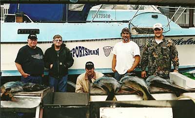 four medium sized halibut caught by Sportsman Fishing Adventures guests