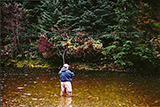 Chris fishing colored water for steelhead