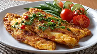 photo of bream marinated in mustard, milk and tobasco pepper sauce with vegetables