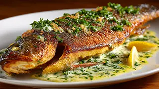 photo of pan fried whole bass with Maitre D' Hotel Sauce